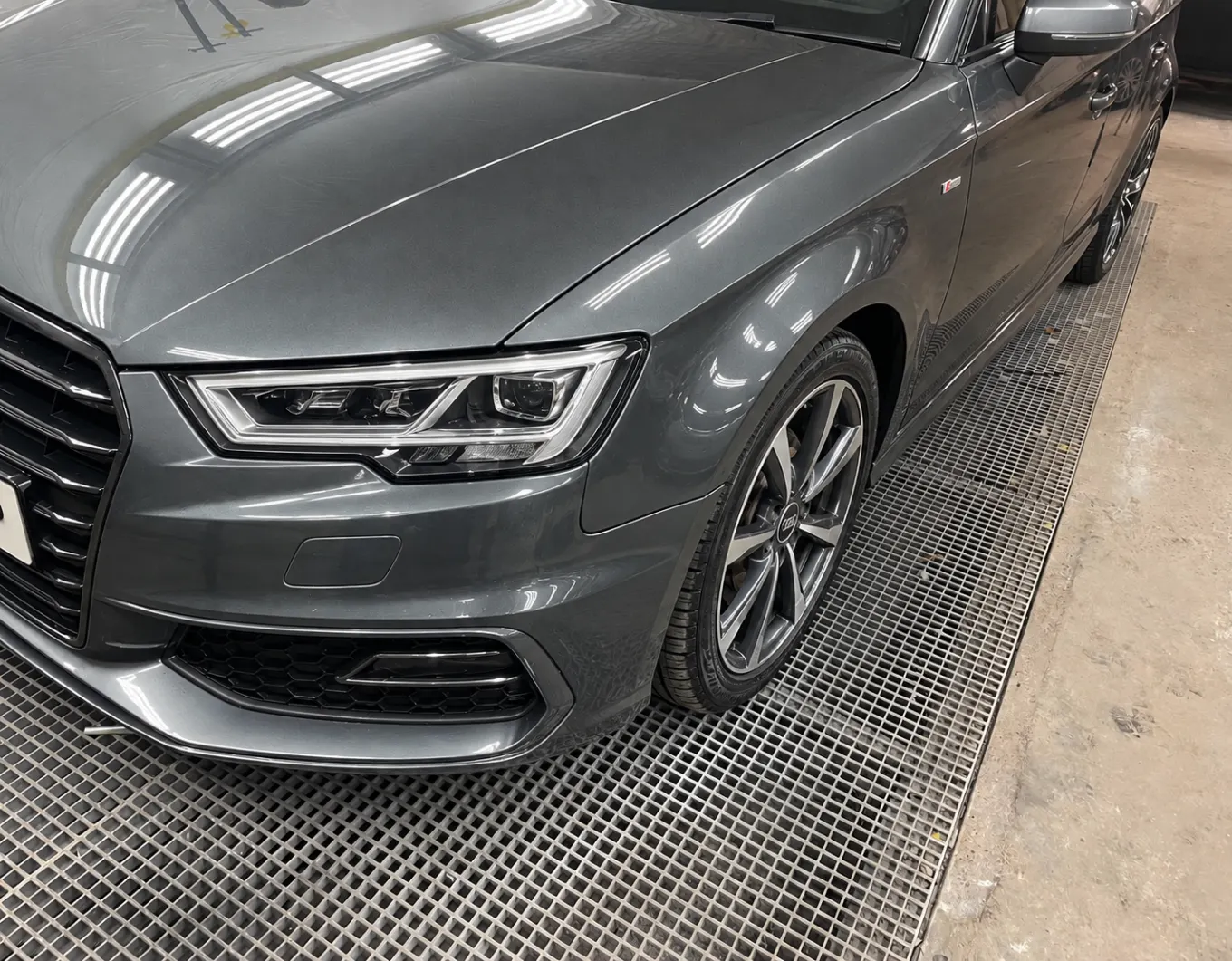 The same Audi A3 finished, the front wing and bumper repaired, painted and refitted